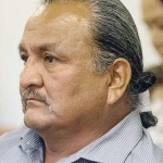 Former Navajo presidential candidate Dale E. Tsosie looks on during a hearing at the Office of Hearings and Appeals in Window Rock. Tsosie and Hank Whitethorme, also a former Navajo presidential candidate, have filed a order of contempt against Chris Deschene and the election office. (Times photo - Donovan Quintero)