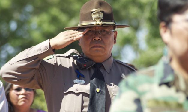 Navajo police officer shot but in stable condition; suspect apprehended