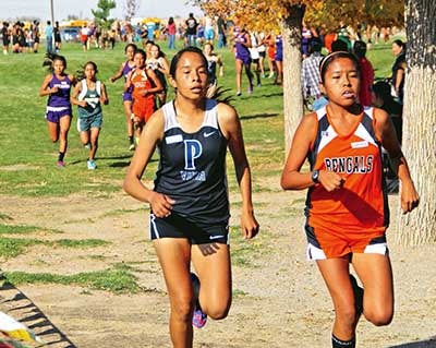 Gallup girls keep a pack to the finish line, place first at KC meet