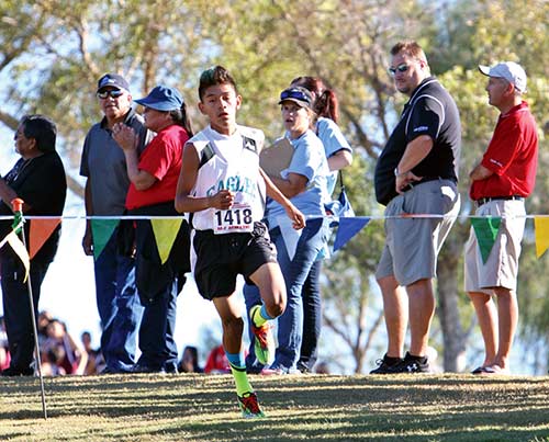 Pinon sophomore Adriano Joe topped an outstanding field of 181 runners for his first state crown at the Arizona Division IV state cross-country meet in Phoenix. He crossed the finish line in 16:32. (Courtesy photo – Eugene R. Begay)