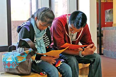 Sister and brother, Mikayla and Shawn Hongeva of Flagstaff, help each other practice their Navajo before auditioning for a part in the Finding Nemo movie, which will be dubbed into the Navajo language. Shawn auditioned for the role of Crush while his sister Mikayla audition for Dori. (Times photo – Terry Bowman)