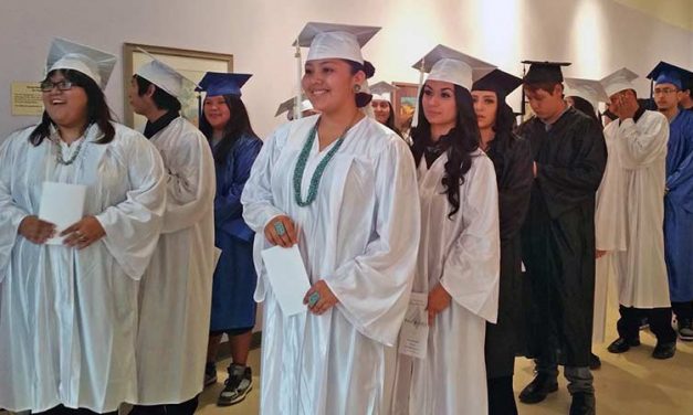 Center hosts graduation for 53 GED students