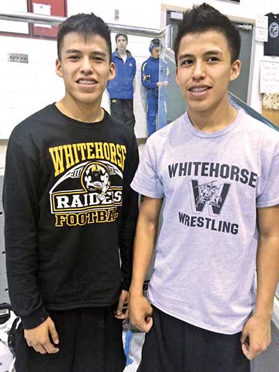 Connection between twins fuels desire on wrestling mat