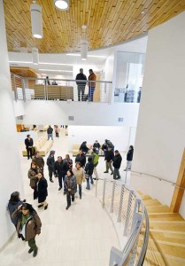 Visitors of the newly renovated Administrative Building 1 take a tour of the new building’s design on Monday in Window Rock. (Times photo - Donovan Quintero)