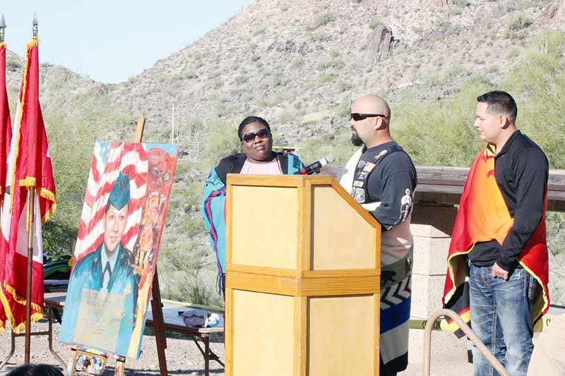 From left to right, Former POW’s Shoshana Johnson, Joseph Hudson and Edgar Hernandez received blankets from Lori Piestewa’s family and thanked the people for their support. (Special to the Times – Shine Salt)