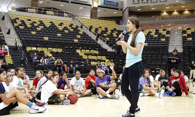 Schimmel visits Navajo Country, motives youth at basketball clinic