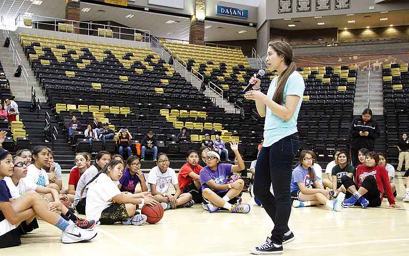Schimmel visits Navajo Country, motives youth at basketball clinic