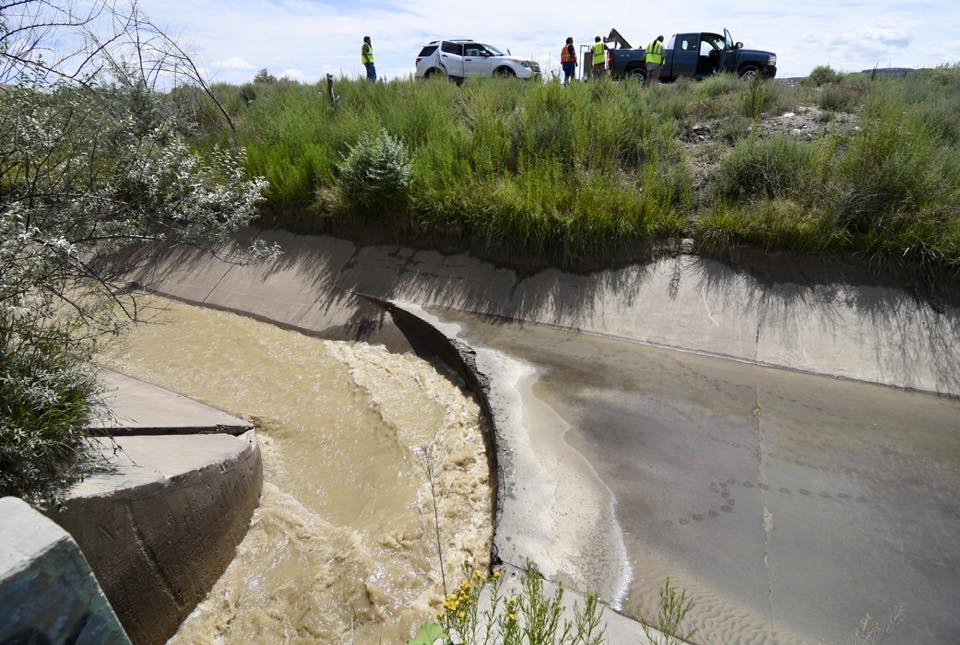 Navajo Nation volunteers with the Authorized Local Emergency Response Team, or A.L.E.R.T., inspect the Upper Fruitland irrigation that has been diverted back into the San Juan River on Aug. 8 in Upper Fruitland, N.M. Since the river was contaminated, tribal officials have turned off the irrigation in an effort to prevent potentially contaminating it. Begaye has decided to not turn reopen the irrigation for farmers and ranchers. ( Times photo - Donovan Quintero)