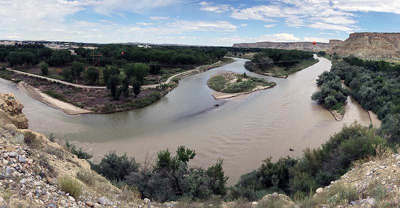 A clearer Animas River, left, joins the San Juan River last Monday in Farmington, N.M. Despite a clearer appearance, Navajo tribal officials continue to caution community members living along the San Juan River to not drink it, swim in it or let their livestock drink it until further notice. (Times photo - Donovan Quintero)