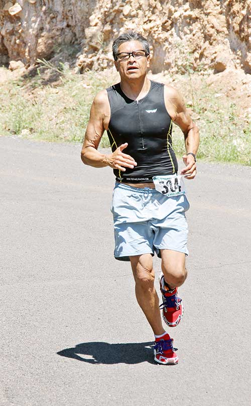 Submitted | Ronald Haven runs during a triathlon in Flagstaff this year. Haven, 58, was diagnosed with Type II diabetes nearly 20 years ago and started running as a way to manage his disease. He now runs half marathons, marathons and competes in Iron Mans and triathlons.