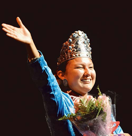 Navajo Times | Donovan Quintero Newly crowned Miss Northern Navajo Teen Nicole Keeswood from Shiprock, N.M., waves to the crowd on Friday at the Phil L. Thomas Performing Arts Center in Shiprock. 