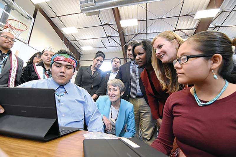 Navajo Times | Donovan Quintero Winslow High School senior Sidrick Dixon, bandana, shows U.S. Secretary of the Interior Sally Jewell a video he’s produced Tuesday during the secretary’s visit in Winslow, Ariz.  