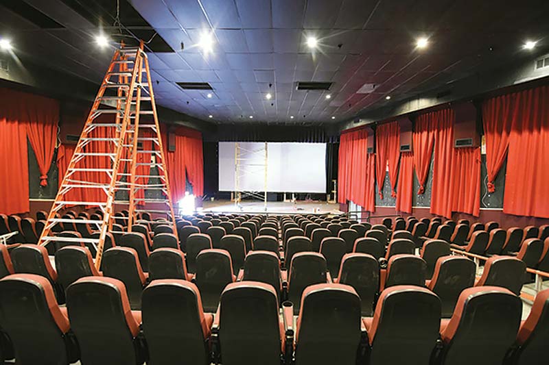 Navajo Times | Donovan Quintero A stepladder leads to an opening in the ceiling of the still-being renovated Window Rock Cinema Wednesday in Window Rock. The 206-seat theater will debut with the premiere showing of Star Wars: The Force Awakens” when it theaters Dec. 18. 