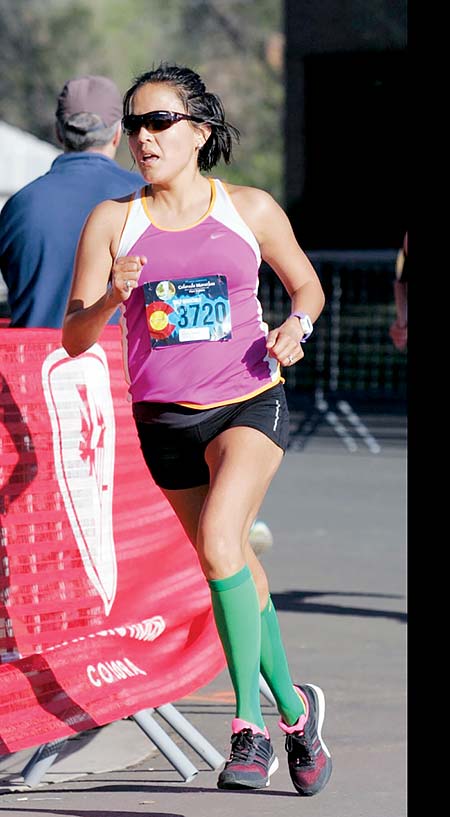 Navajo Times | Courtesy Photo Chinle-born Navajo Linnabah Snyder runs the Colorado Half Marathon in Fort Collins in May 2015, before she qualified for the February Olympic trials at the at the California International Marathon on Dec. 4.