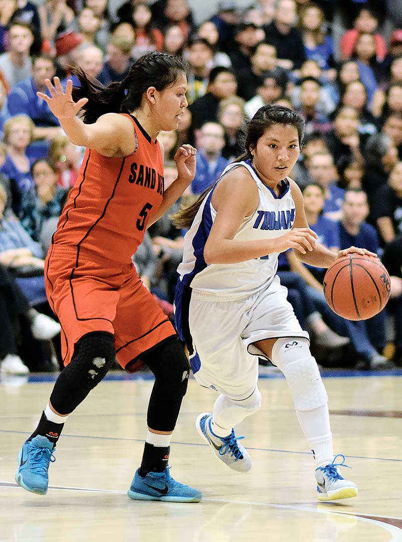 Navajo Times | Donovan Quintero Valley Christian Lady Trojan Anna Gorman, right, goes against Page Lady Sand Devil Ariel Austin (5) Saturday evening in Chandler, Ariz. Gorman is the starting point guard for the No. 2 Lady Trojans.