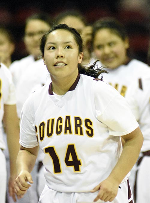 Navajo Times | Donovan Quintero Rock Point Lady Cougar Pashen Johnson (14) smiles Friday morning after winning the Arizona Division V semifinal game against the Greyhills Academy Lady Knights at the Prescott Valley Events Center in Prescott Valley, Ariz. 