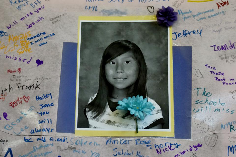 Navajo Times | Donovan Quintero A photograph of Ashlynne Mike is decorated by condolences handwritten and made into a poster Friday at the Farmington Civic Center in Farmington.