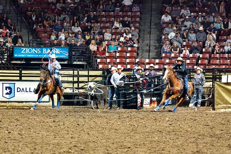 Submitted Derrick Begay (right) ropes his end of the steer at the ERA Tour Stop in Salt Lake City while his partner Clay O’Brien Cooper waits his turn. Both cowboys lead the world standings with 1,175 points heading into this weekend’s Tour Stop at Tingley Coliseum in Albuquerque.