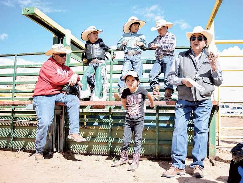 Navajo Times | Krista Allen Eugene Charley speaks to young cowboys and cowgirls at the end of the day on May 7, during his 30th annual Championship Bull Riding School in Kayenta, Ariz.
