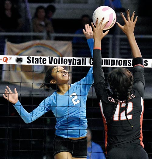 File photo Navajo Prep Diamond Jones attempts a spike at last year’s New Mexico Class 3A state volleyball tournament. The Lady Eagles were bumped up a class and they will now compete in 4A District 1.