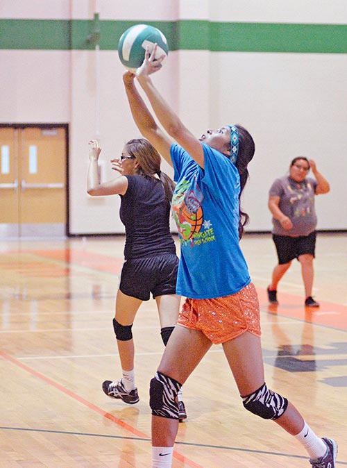 Navajo Times | Paul Natonabah Returning letterman and senior Ricondra Yazzie gets under the ball during volleyball practice at Wingate High School on Monday.
