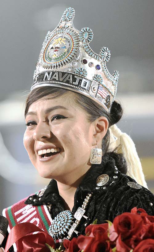 New Miss Navajo Ronda Joe smiles after being crowned at the Navajo Nation fair, Saturday, Sept. 10, 2016.