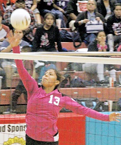 Sunnie R. Clahchischiligi | Navajo Times Navajo Preparatory School’s Harlei Haceesa (13) tips the ball over the net in a 4A District 1 match with Shiprock High School on Tuesday. Shiprock handed Navajo Prep their first district loss of the season.