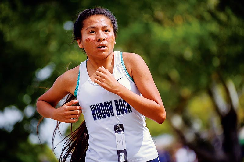 Navajo Times | Adron Gardner Window Rock Scout Chamique Duboise runs in the girls’ varsity race during the Arizona Division III, Section IV Cross-Country meet at the Hidden Cove Golf Course in Holbrook on Oct. 29. Duboise finished in second place behind Prescott’s Makennah Mills with a time of 20:07.50.