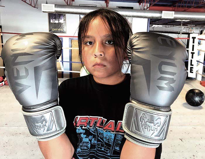 Young Diné brothers learn the boxing trade