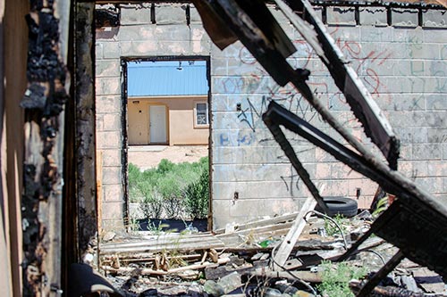 Abandoned houses in Fort Defiance create eyesore, danger