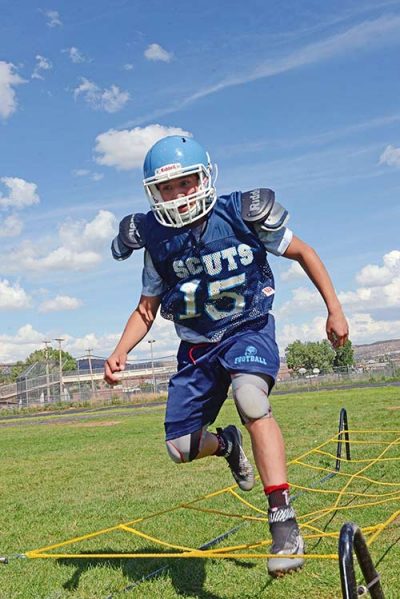 Football player on grassy field