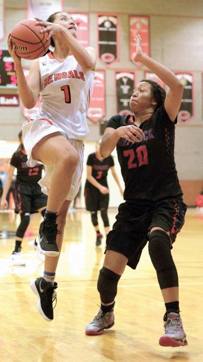 Girls scrap for ball on court.