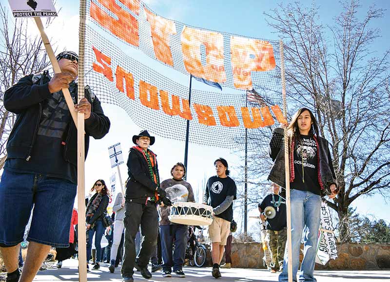 Protesters march against Snowbowl, snowmaking