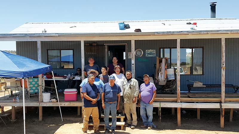 Church, volunteers repair roof for Lewis