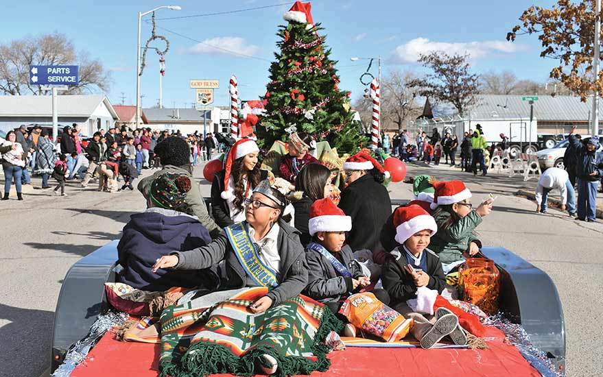 Snow grounds balloons, parade spreads holiday cheer