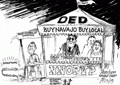 Buy Navajo. Buy Local. DED booth. Dineh Chamber of Commerce sits to the side.