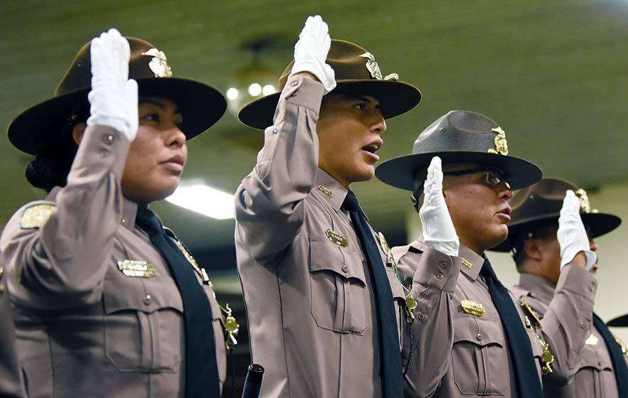 ‘Reliable, responsive, trustworthy’:   Class 54 graduates from police academy