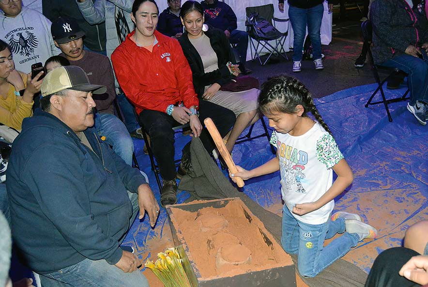 A sense of home: 10th annual shoe game brings songs, laughter to urban Navajos