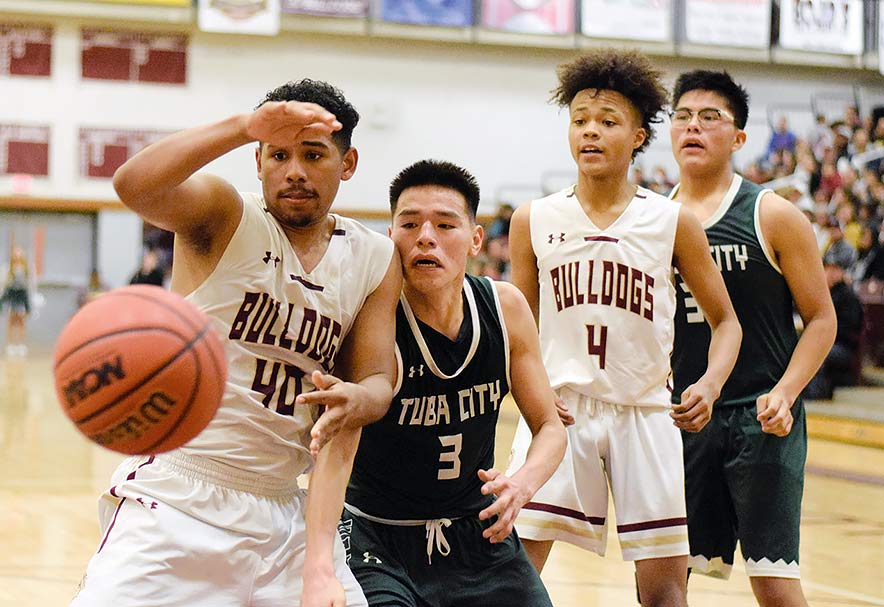 Winslow boys heat up from downtown to beat Tuba City