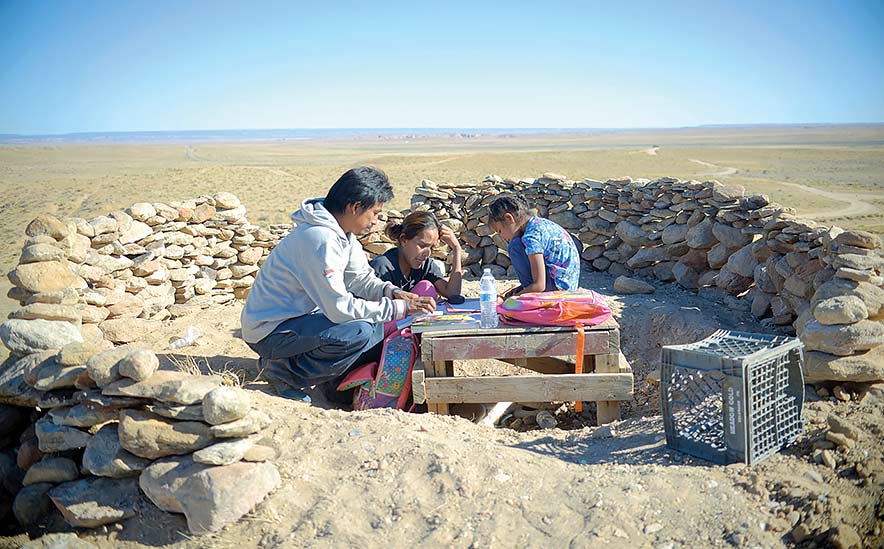 Hill becomes makeshift classroom for a Fish Point family