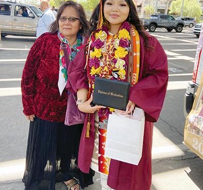 Digital high school holds live drive-thru graduation