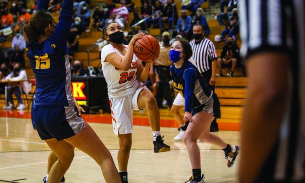 Bigs tip the scales for Gallup girls in quarterfinals
