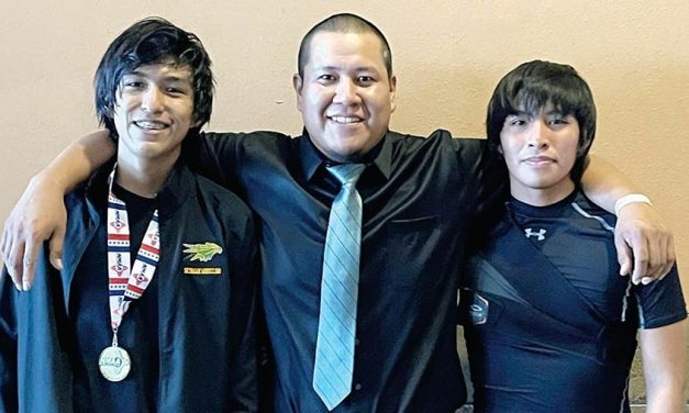 Newcomb Skyhawk makes histor: Junior wins first-ever state wrestling title, fulfills dream