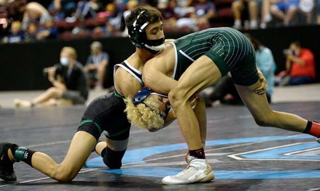 ‘A battle well fought’: Farmington, seeded third, wins 5A state wrestling title