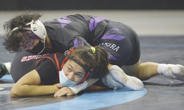 A ‘we,’ not ‘me’ mentality: Miyamura girls win third state wrestling championship
