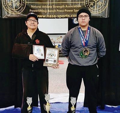 After year of pandemic, Diné father, son roar back to powerlifting