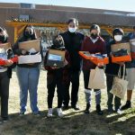 Giving thanks, giving back:  Richardson delivers shoes for Native students