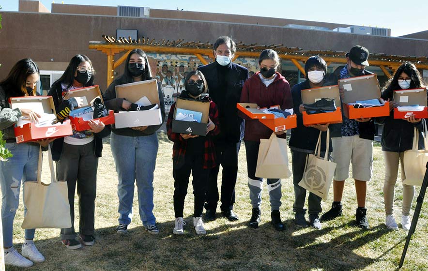 Giving thanks, giving back:  Richardson delivers shoes for Native students