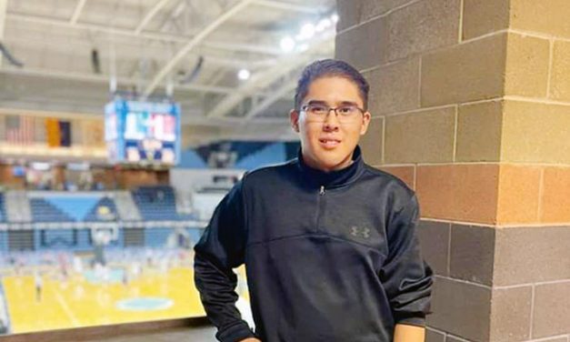 Video highlighter:  COVID-19 does not stop fan from helping local athletes