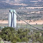Empty uranium transport truck rolls over near Black Mesa, injuring driver